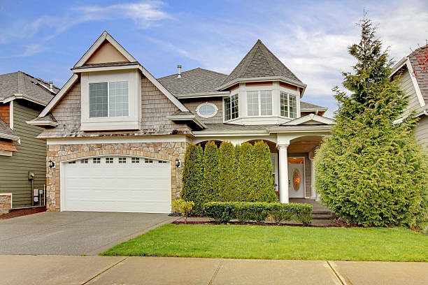 istock House with stone wall trim and column porch 495191379