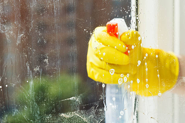 istock foamy liquid on window glass during washing 495192463
