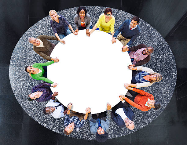 istock Aerial View of Multiethnic People Around the Table 495193219