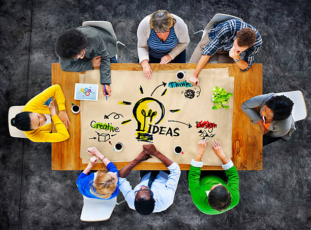 Multiethnic Group of People Planning Ideas Multiethnic Group of People Planning Ideas brainstorming stock pictures, royalty-free photos & images