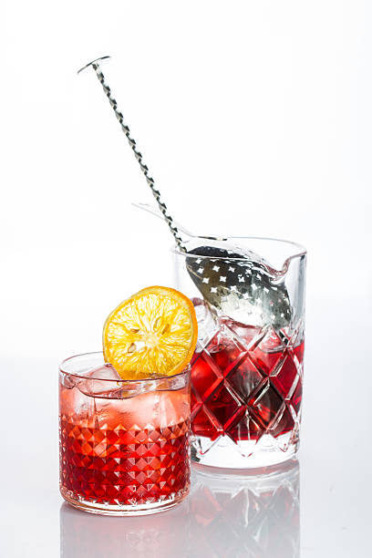 istock Amber cocktail in a glass isolated on white background 495199178