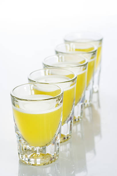 istock Beautiful shot glasses back lit. yellow 495199638