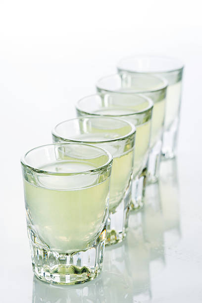 istock Beautiful shot glasses back lit. yellow 495199672