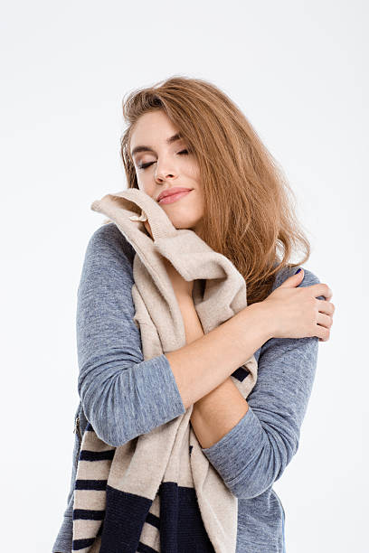 istock Young pretty woman holding sweater 495199790