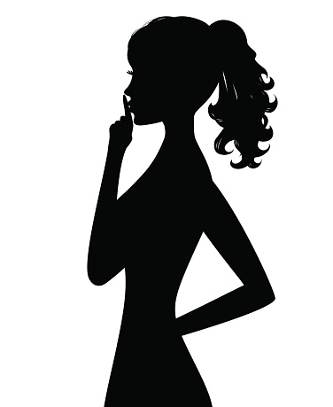 Silhouette of woman holding finger on her lips