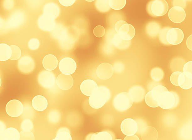 Abstract golden lights bokeh background stock photo