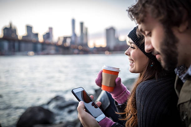 istock Young Couple Enjoying Sunset at Brooklyn Bridge, NYC 495200506