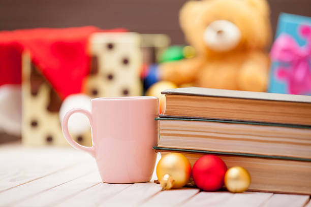 istock Cup of coffee or tea with books 495201350