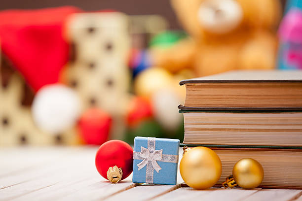 istock Books with christmas gifts 495201612