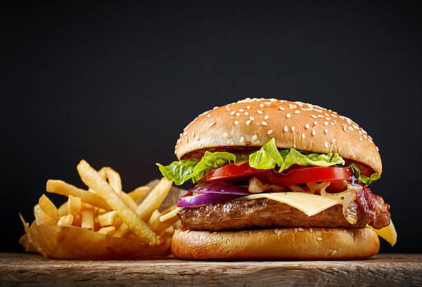 fresh tasty burger fresh tasty burger and french fries on wooden table fast food restaurant photos stock pictures, royalty-free photos & images
