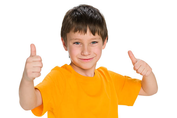 istock Cute little boy holds his thumbs up 495204792