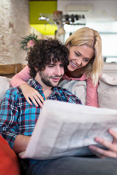 istock Couple reading the newspaper 495208059