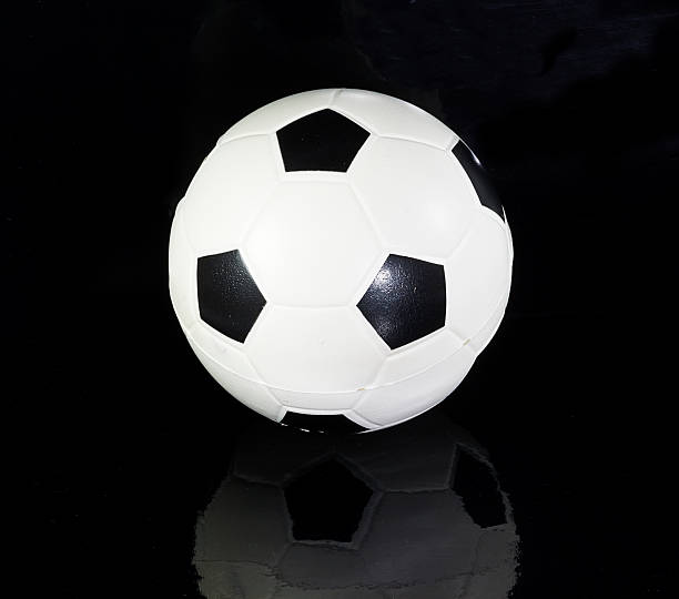 istock soccer ball isolated on black 495209899