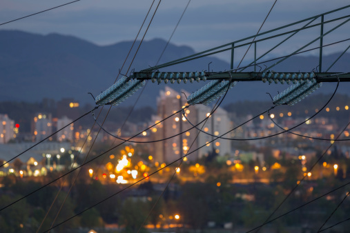 Photograph of high power electricity grid taken at dawn