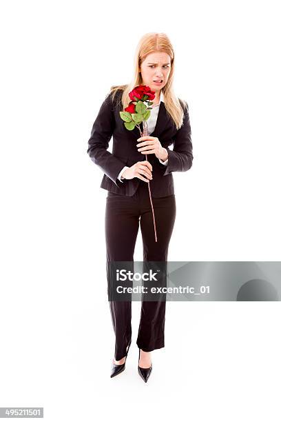 Disappointed Businesswoman Holding A Red Rose Flower Stock Photo - Download Image Now