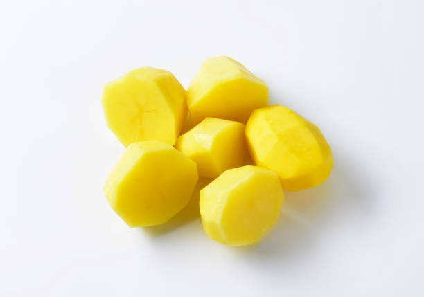 istock Halved peeled potatoes 495211962