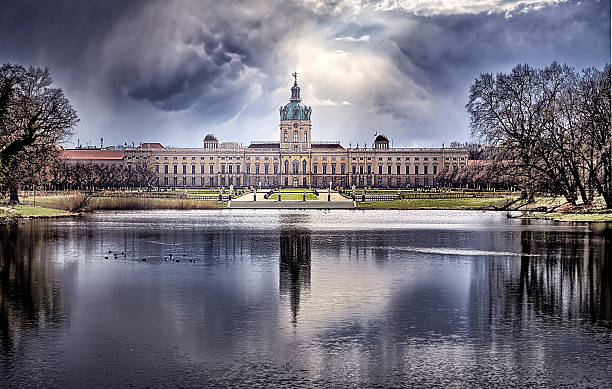 istock Schloss Charlottenburg Berlin with dramatic sky and lake 495212458