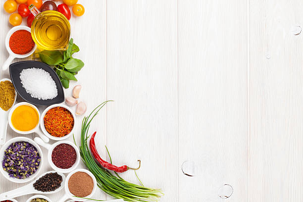 istock Various spices on white wooden background 495213560