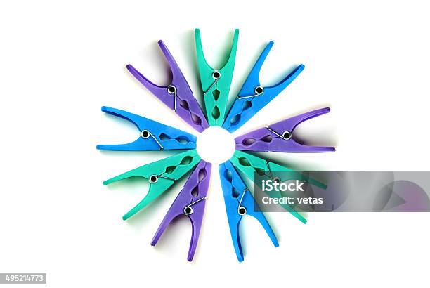 Plastic Clothes Pegs On A White Background Stock Photo - Download Image Now - Blue, Circle, Close-up