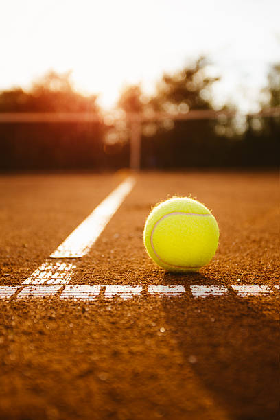 Ball on a tennis court stock photo