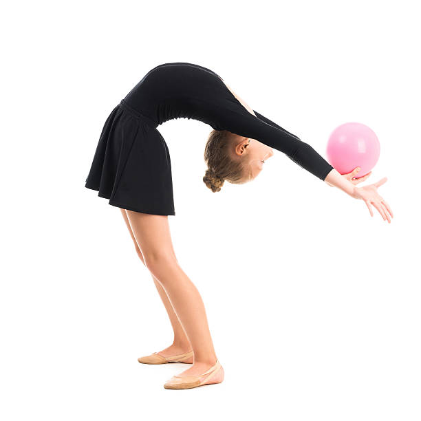 istock little gymnast doing exercise with ball 495217016
