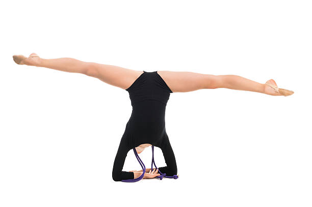 istock little gymnast doing exercise with skipping rope 495217178