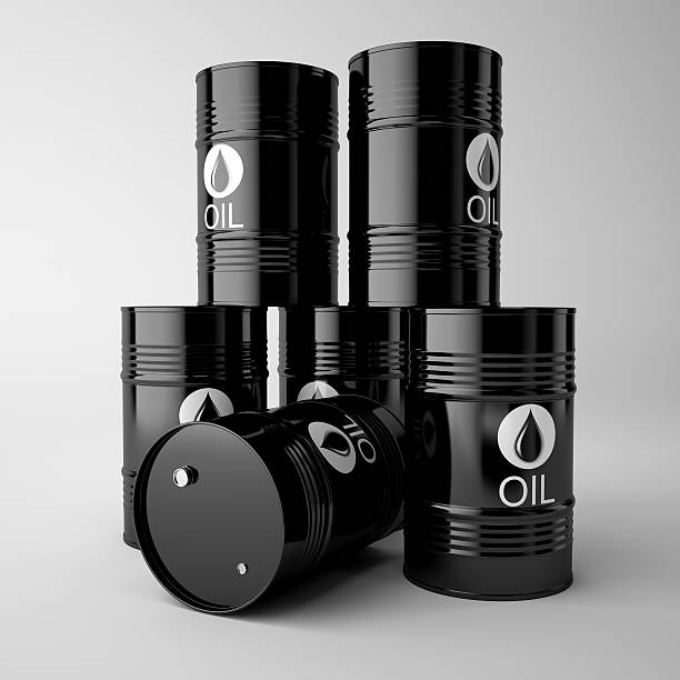 istock Black oil barrels isolated on white background. 495219428