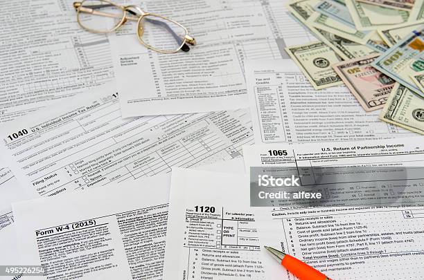 Tax Form Individual Tax Return With Pen Stock Photo - Download Image Now - 2015, Finance, Finance and Economy