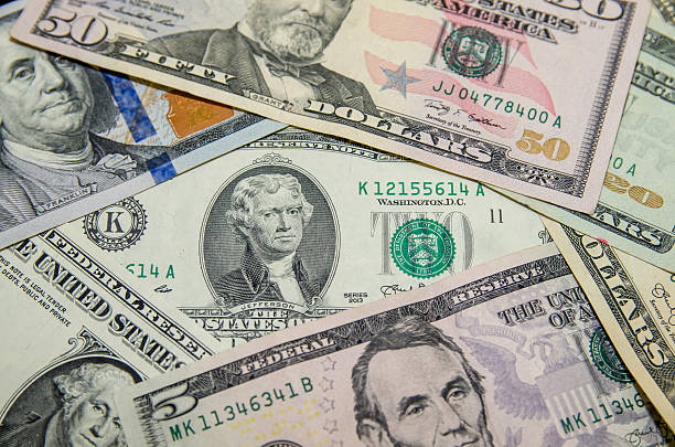 istock Pile of dollar bills 495227680