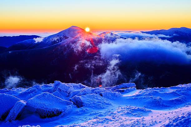istock Sunrise in snowy mountains 495230132