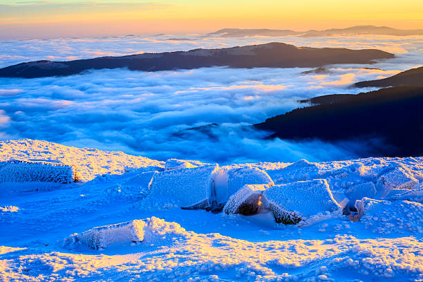 istock Sunrise in snowy mountains 495230660