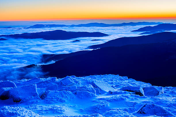 Sunrise in snowy mountains