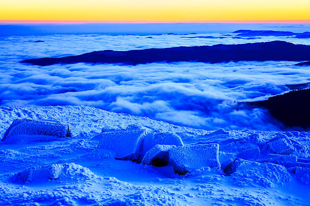 istock Sunrise in snowy mountains 495231814
