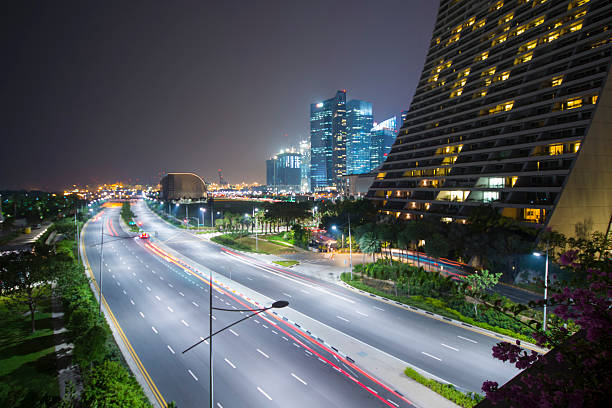 istock light trails on the road in Singapore 495232186