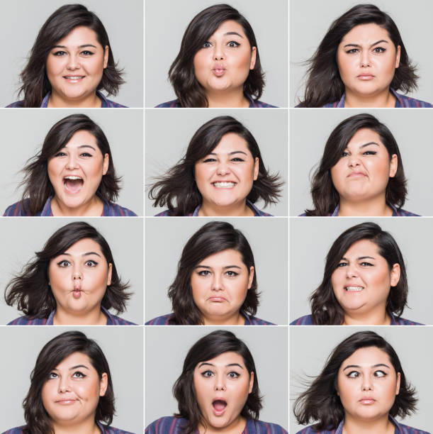 istock Young woman making various facial expressions, studio shot 495238108