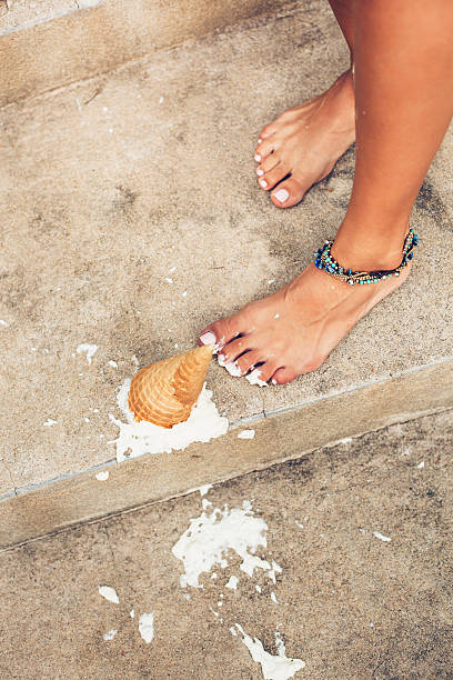 istock Ice cream fell on asphalt top view 495238452