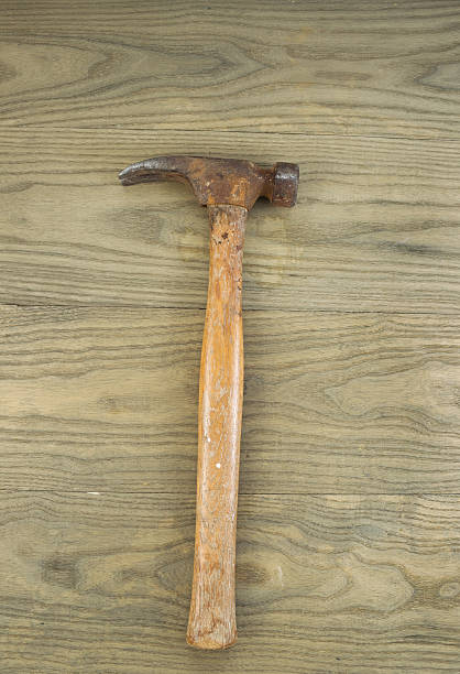 istock Aged Claw Hammer on Old Wood 495238815
