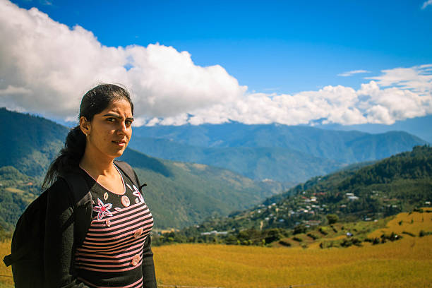 Woman traveling in hill station called Bhutan in Indian subcontinent. Shot on the way to Phunakha in Bhutan.