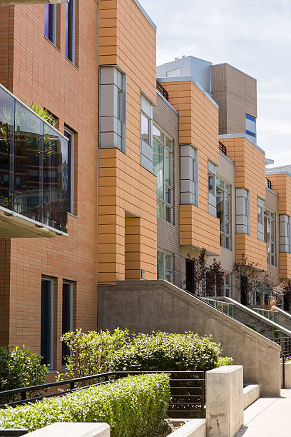 Townhomes Row of contemporary townhomes at Riverside development. new urbanism stock pictures, royalty-free photos & images