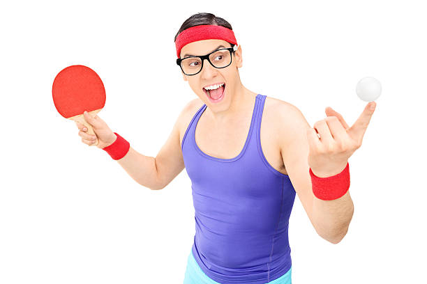 istock Young man holding ball and a ping pong bat 495240007