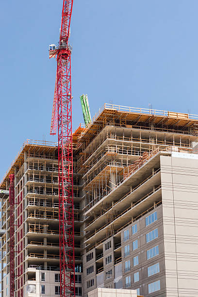 Condominiums Contemporary condominium building under construction in downtown Denver. new urbanism stock pictures, royalty-free photos & images