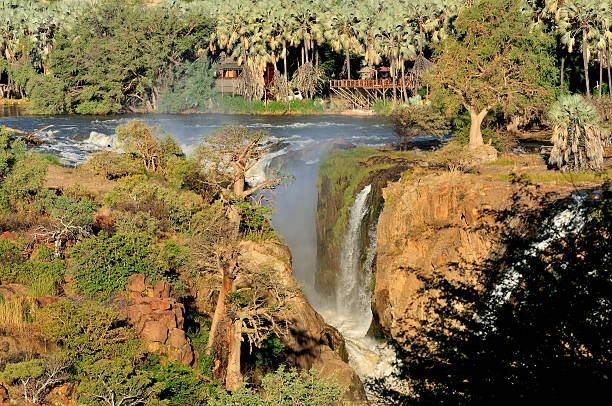 Epupa waterfalls in on the border of Angola and Namibia Small portion of the Epupa waterfalls in the Kunene river on the border of Angola and Namibia kaokoveld stock pictures, royalty-free photos & images