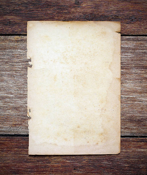 istock old paper on brown aged wood 495241079