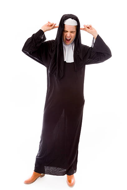 istock Young nun shouting with fingers in her ears 495241485