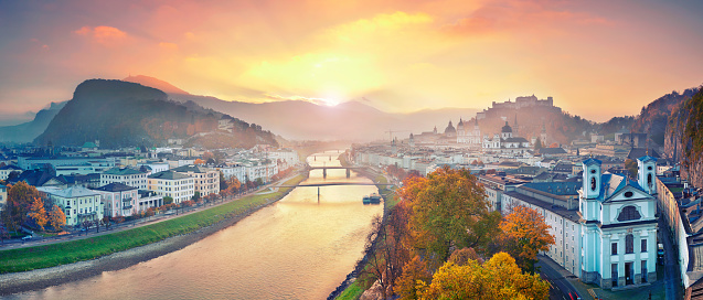 Panoramic image of the Salzburg during autumn sunrise. This is composite of 5 vertical images stitched together in photoshop.