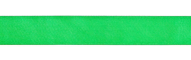 wide green satin ribbon isolated on white