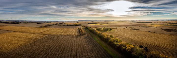 Aeria panoramic view of South Dakota farm land painted with the sunrise and autumn colors.