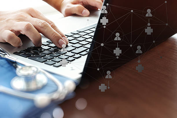 istock Doctor working with digital tablet and laptop computer 495243656
