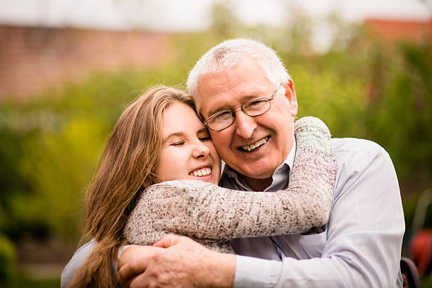 istock Grandfather and grandchild hug 495249514