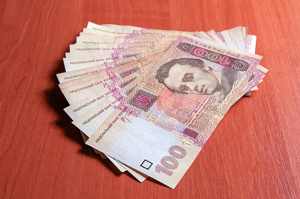 istock Some Ukrainian one hundred-hryvnia notes 495250576